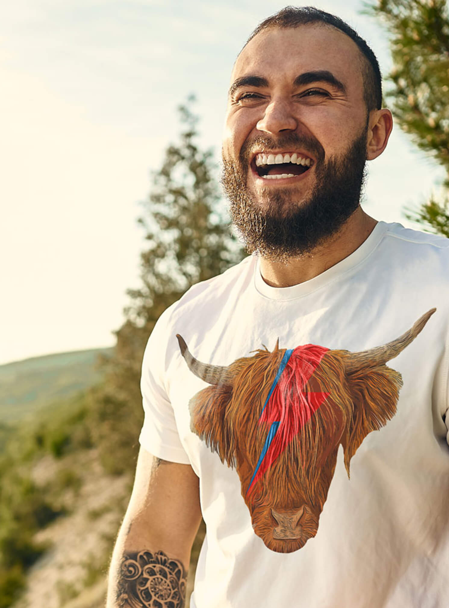 Man wearing Davie Mooie novelty highland cow t-shirt